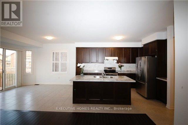 1457 Chretien Street, Milton, Ontario  L9J 1J1 - Photo 4 - W12387451
