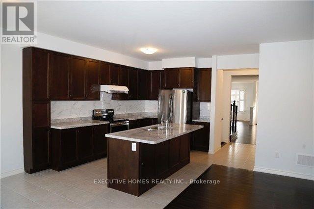 1457 Chretien Street, Milton, Ontario  L9J 1J1 - Photo 5 - W12387451