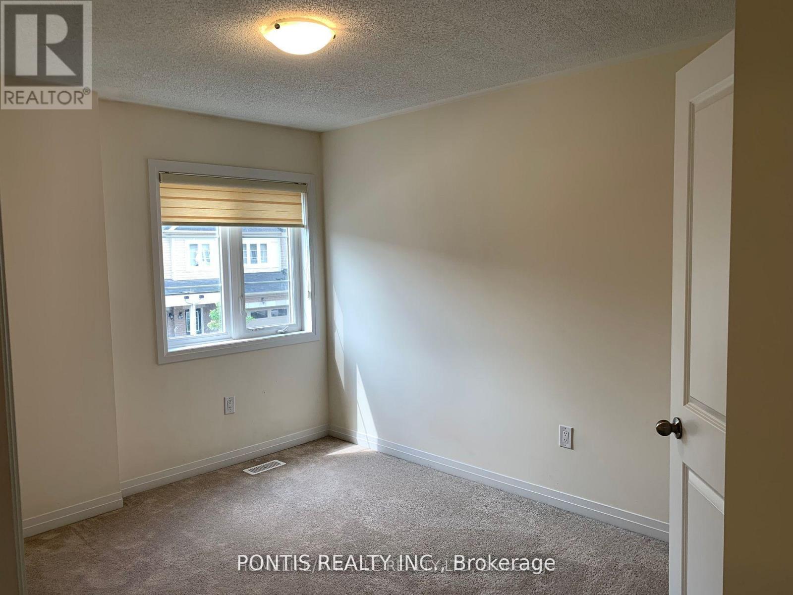 26 Brixham Lane, Brampton, Ontario  L7A 5K2 - Photo 5 - W12387864