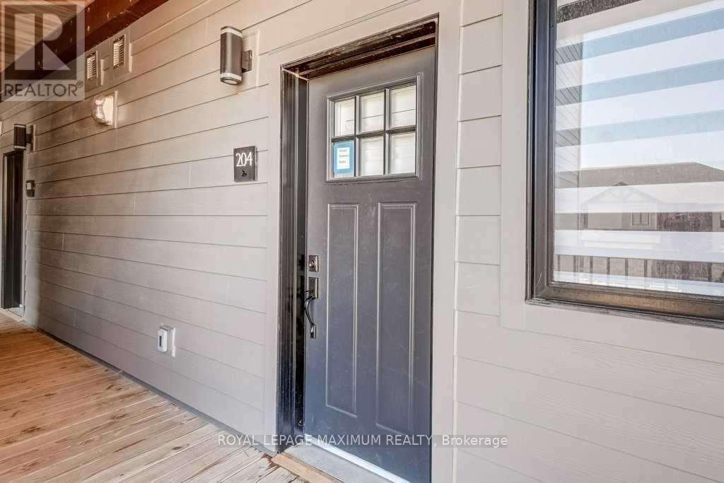 204 - 10 Beausoleil Lane, Blue Mountains, Ontario  L9Y 2X5 - Photo 3 - X12387836