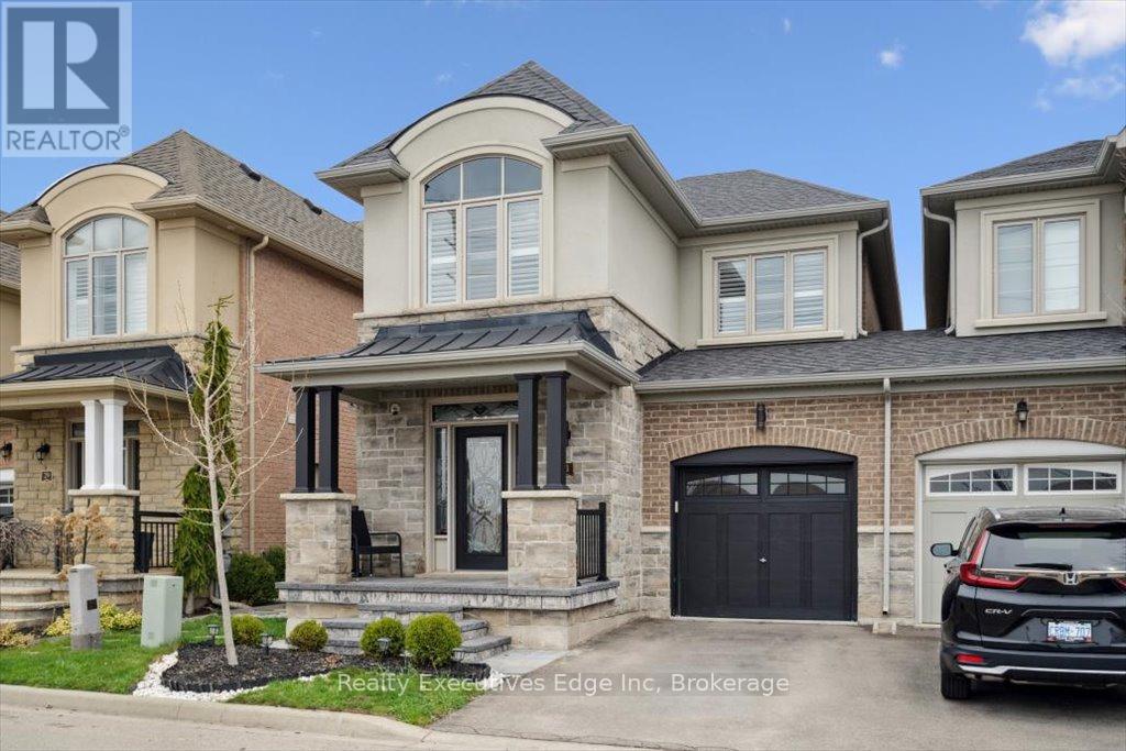 31 Rainforest Lane, Halton Hills, Ontario  L7G 0L8 - Photo 2 - W12327462