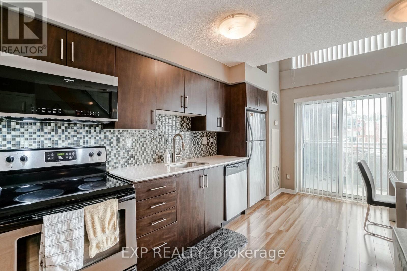 208 - 215 Queen Street E, Brampton, Ontario  L6W 0A9 - Photo 13 - W12389041