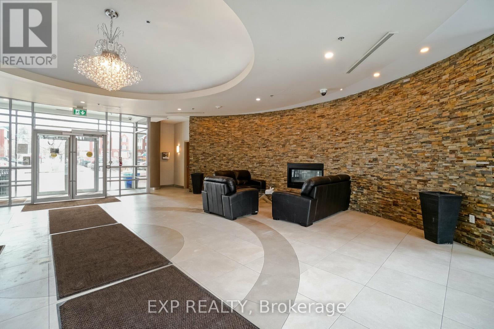 208 - 215 Queen Street E, Brampton, Ontario  L6W 0A9 - Photo 2 - W12389041