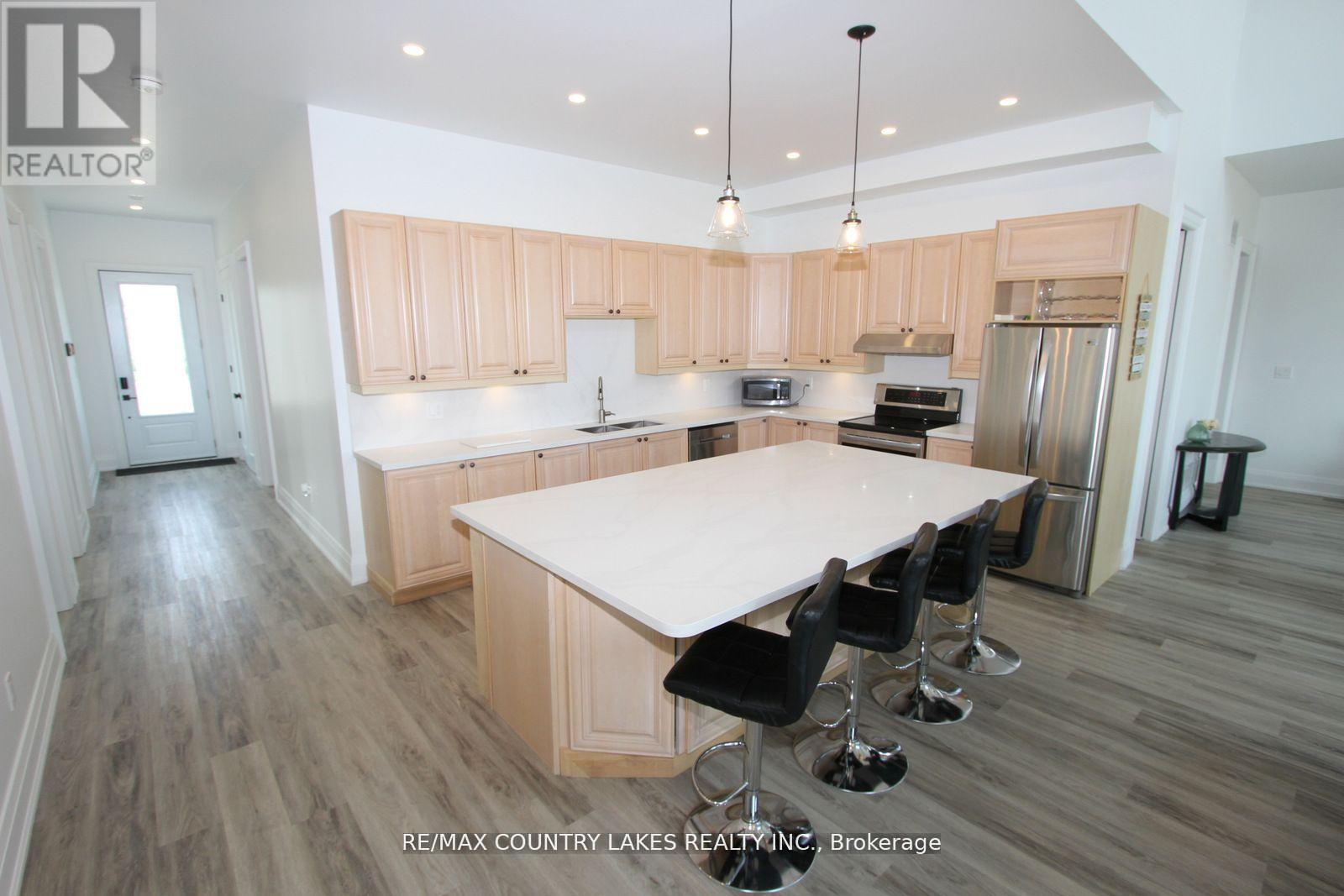 130 Baker Boulevard, Kawartha Lakes, Ontario  K0M 2B0 - Photo 5 - X12389305