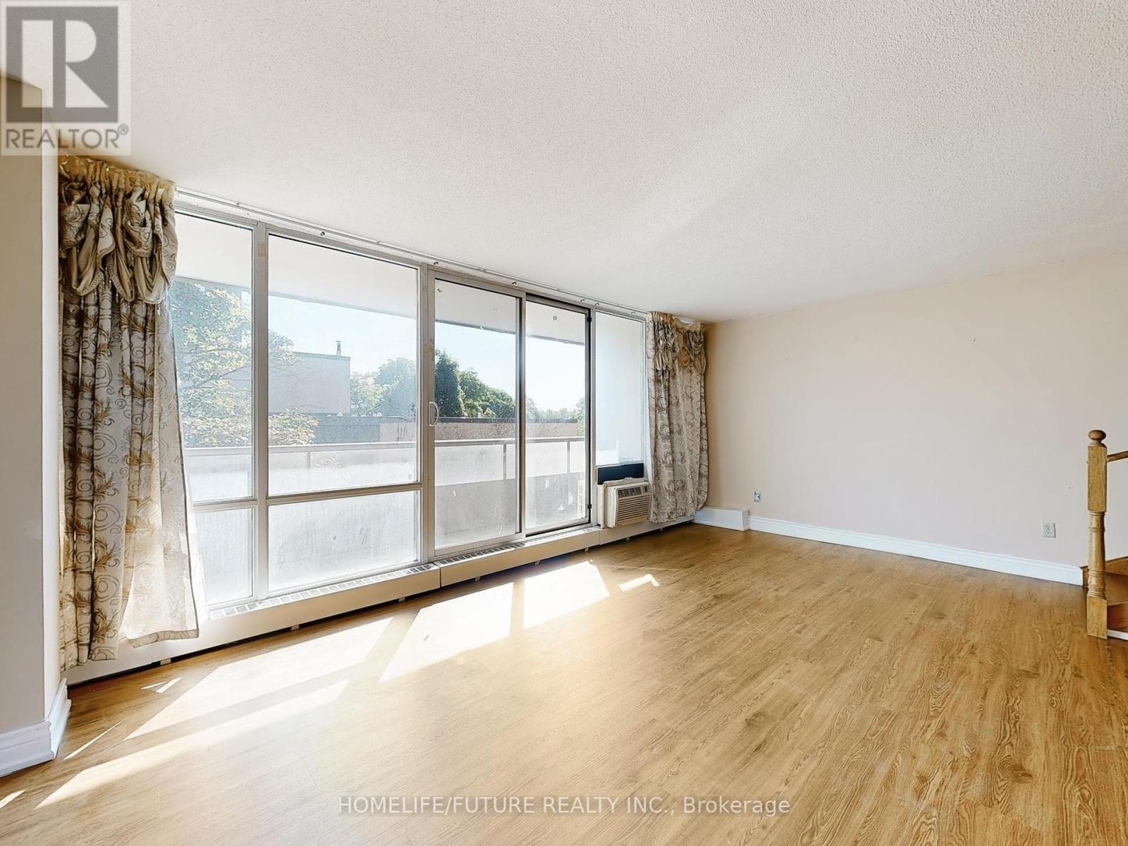 310 - 31 Four Winds Drive, Toronto, Ontario  M3J 1K9 - Photo 8 - W12389425