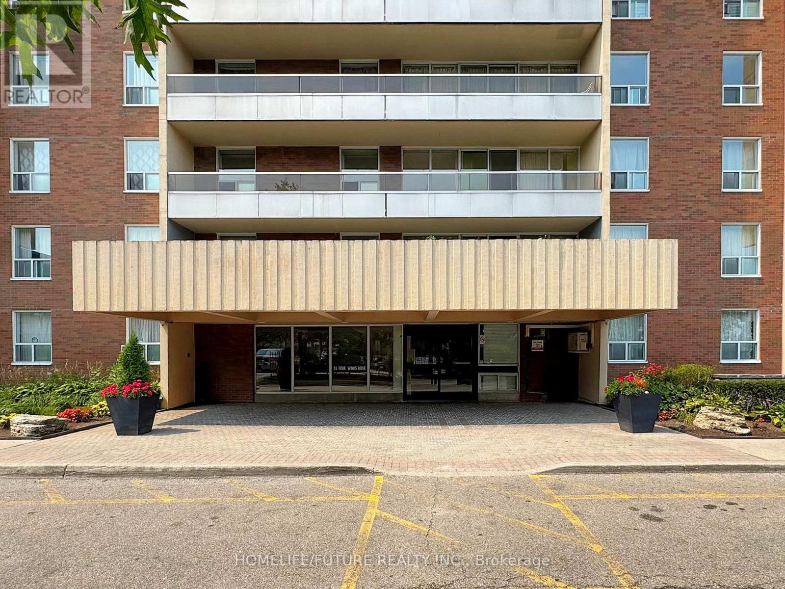310 - 31 Four Winds Drive, Toronto, Ontario  M3J 1K9 - Photo 2 - W12389425