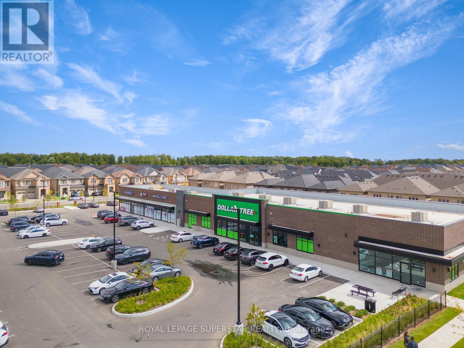 98 Donald Ficht Crescent, Brampton, Ontario  L7A 5H8 - Photo 4 - W12390621