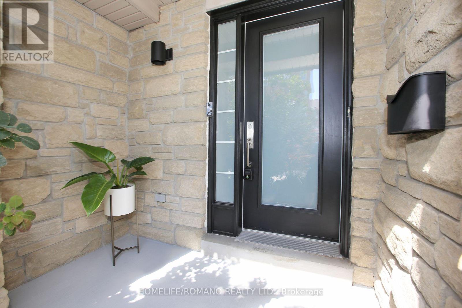 14 Ramage Lane, Toronto, Ontario  M9C 5S6 - Photo 2 - W12391001