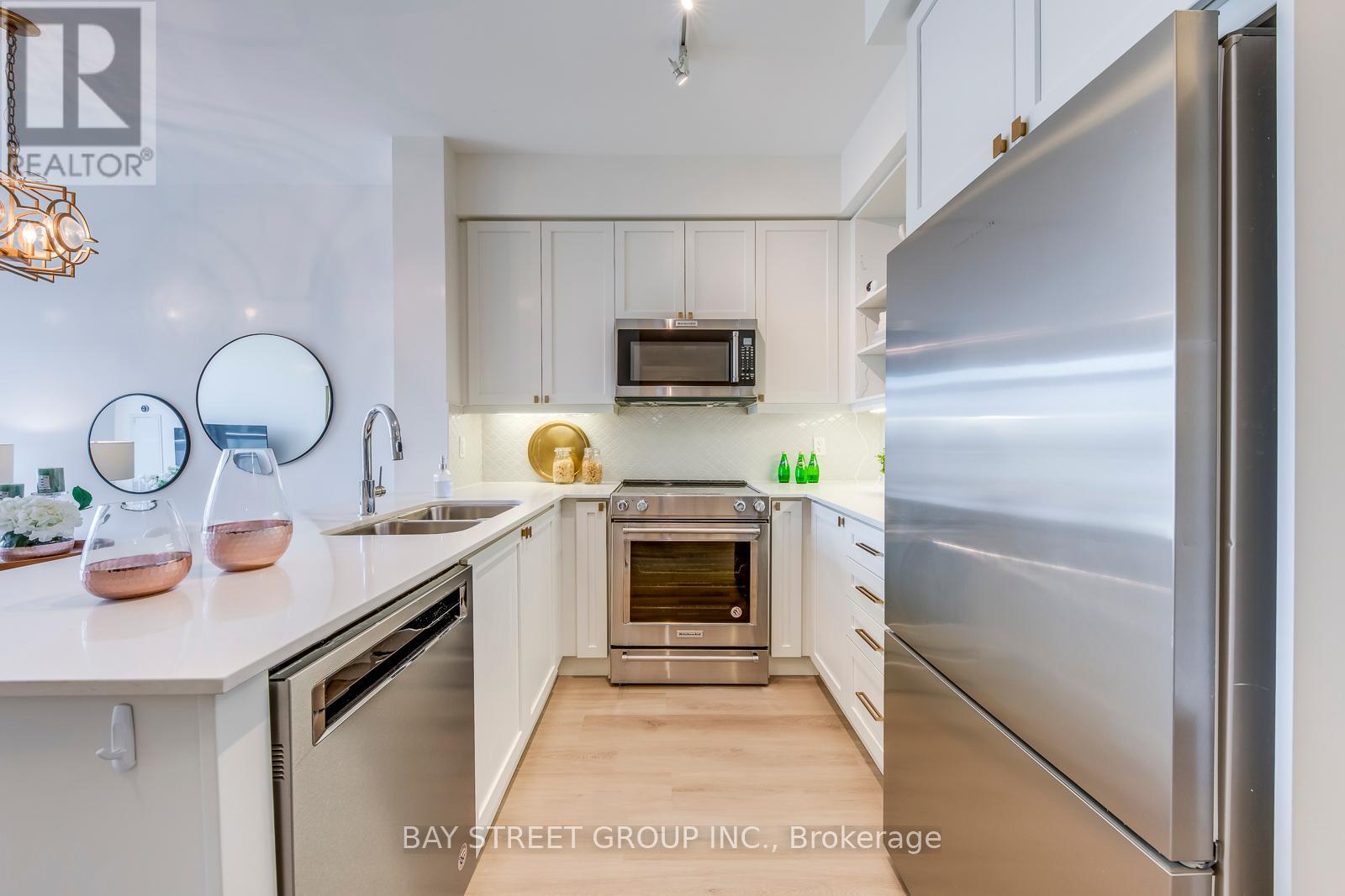 404 - 65 Oneida Crescent, Richmond Hill (Langstaff), Ontario  L4B 0A1 - Photo 6 - N12391822