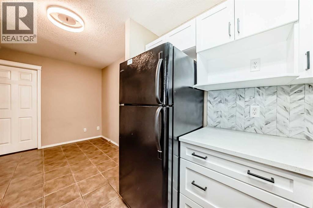 8106, 70 Panamount Drive Nw, Calgary, Alberta  T3K 6L7 - Photo 4 - A2255150