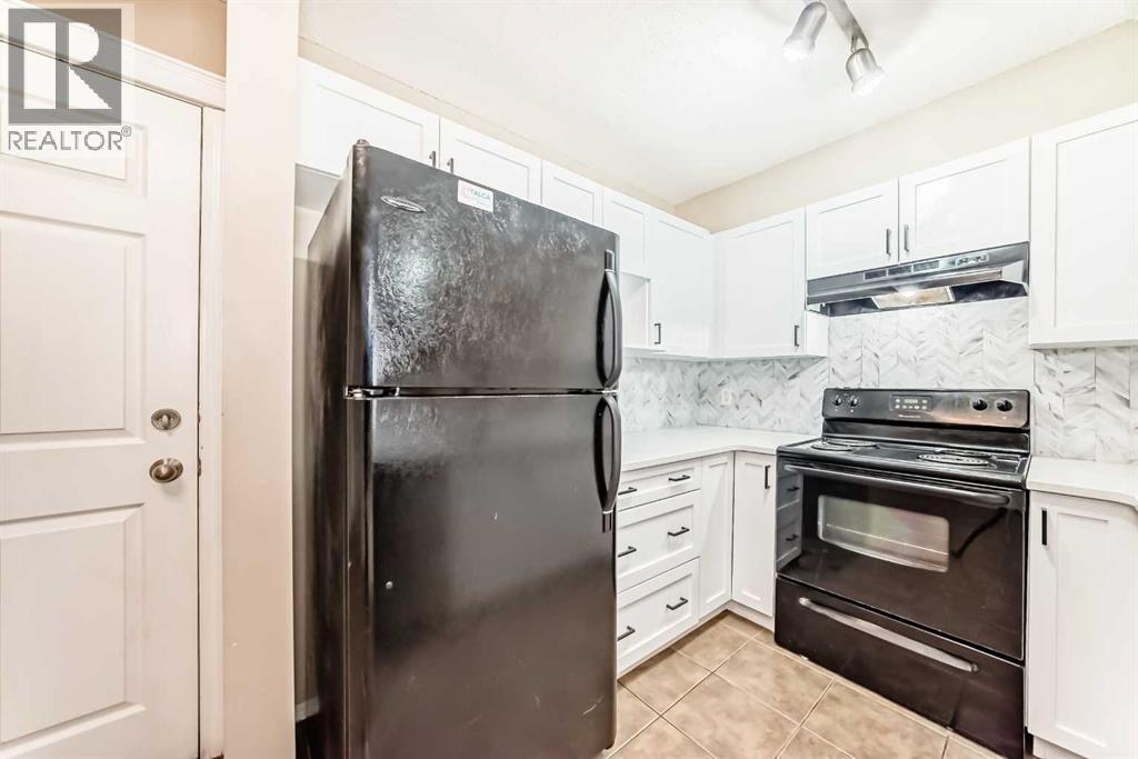 8106, 70 Panamount Drive Nw, Calgary, Alberta  T3K 6L7 - Photo 5 - A2255150
