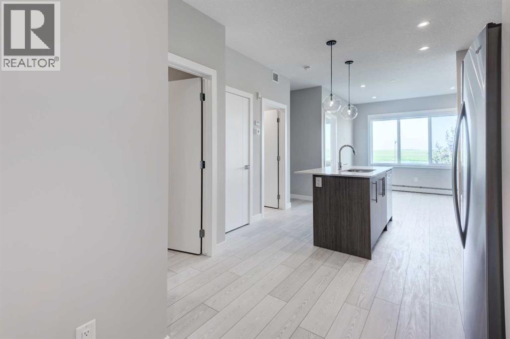 2215, 6 Merganser Drive W, Chestermere, Alberta  T1X 2Y2 - Photo 4 - A2246865