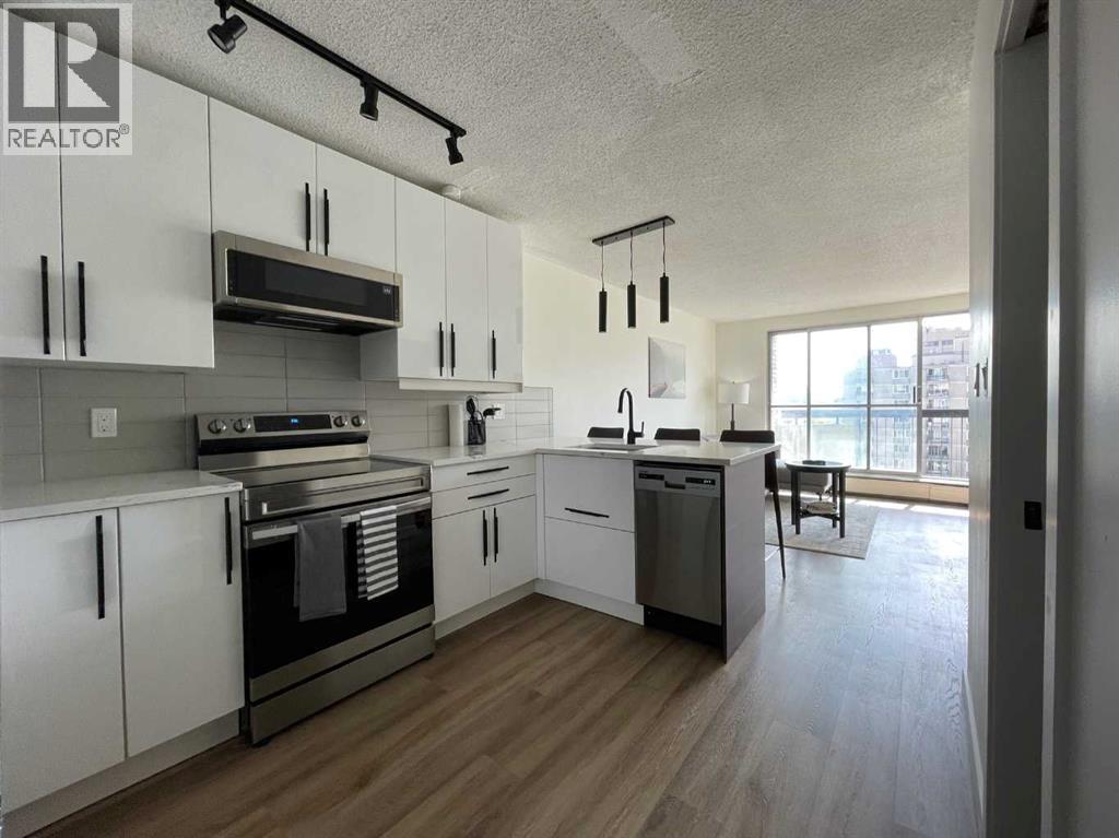 703, 340 14 Avenue Sw, Calgary, Alberta  T2R 0M4 - Photo 1 - A2254720