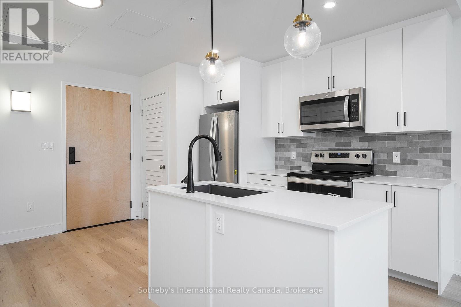 221 - 121 Mary Street, Clearview (Creemore), Ontario  L0M 1G0 - Photo 1 - S12392556