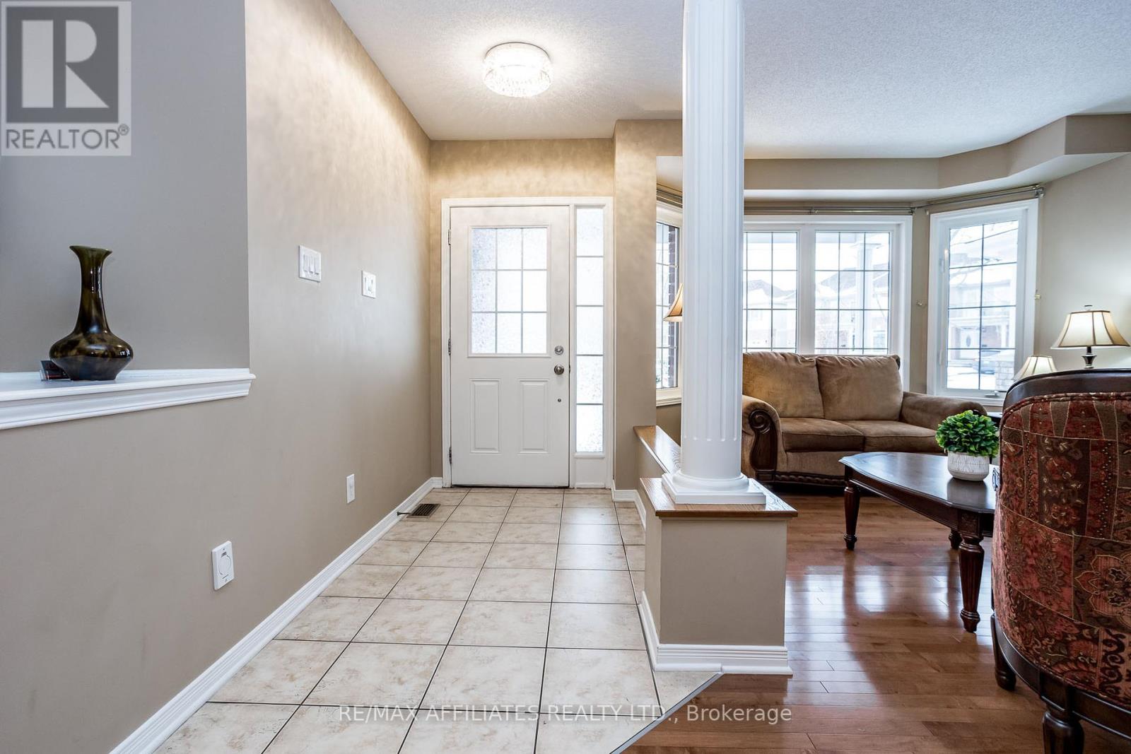 232 Hidden Meadow Avenue, Ottawa, Ontario  K1T 0C1 - Photo 3 - X12392550