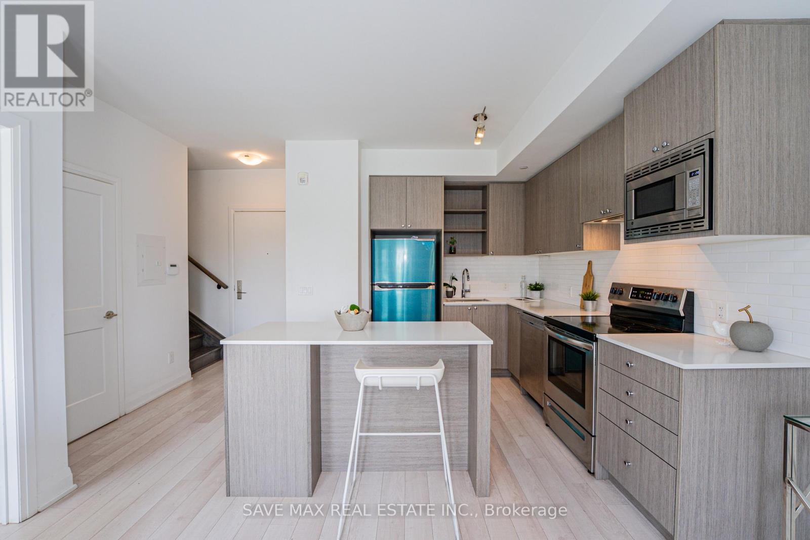 215 - 155 Downsview Park Boulevard, Toronto, Ontario  M3K 0E3 - Photo 11 - W12392840