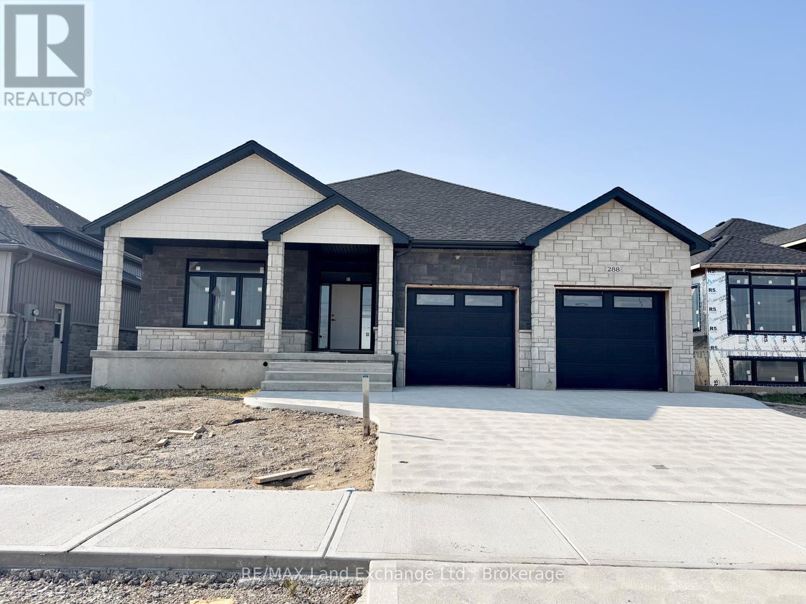 Come have a look at this split plan bungalow "The Willow" at 288 Ridge Street in Port Elgin. This split plan 1752sqft bungalow will not disappoint; with 3 + 2 bedroom, 3 full baths including a luxury ensuite with soaker tub, tiled shower and 2 sinks designed for comfort. Nestled just a short walk from the beach, this brand-new home boasts exceptional features that set it apart from the rest. Step inside to discover a stunning great room with vaulted ceilings and gas fireplace that creates an airy, open atmosphere perfect for family gatherings and entertaining. The sunset views can be captured from the partially covered back deck measuring 12 x 20. The gourmet kitchen, is outfitted with Quartz counters and features a walk-in pantry. Additional highlights include, a two-car garage with a separate staircase to the basement, hardwood staircase from the main floor to the basement, hardwood and ceramic throughout the main floor, central air, 2 automatic garage door openers, sodded yard, concrete drive and more. With all the extras and a location that's just a leisurely stroll from the beach, this home is more than just a place to live it's a lifestyle. HST is included in the list price provided the Buyer qualifies for the rebate and assigns it to the Builder on closing. Some colour selections maybe available for those that act early. Prices subject to change without notice (id:48254)