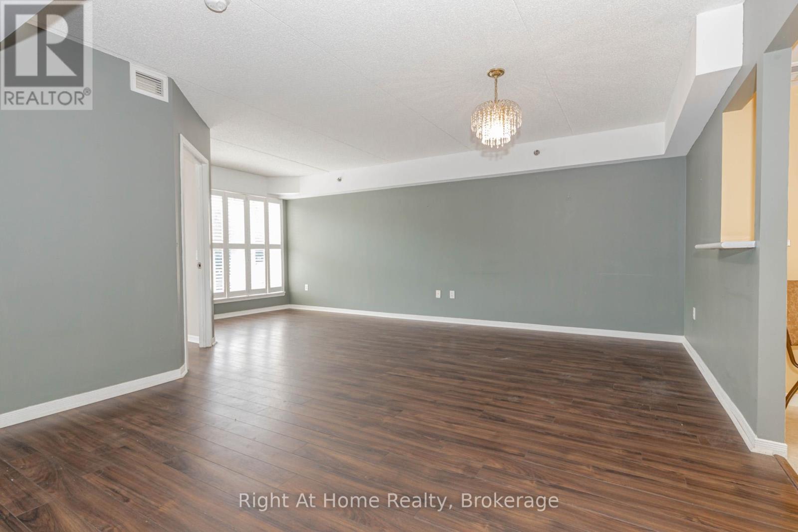 203 - 137 Martin Street, Milton, Ontario  L9T 5H4 - Photo 6 - W12393095