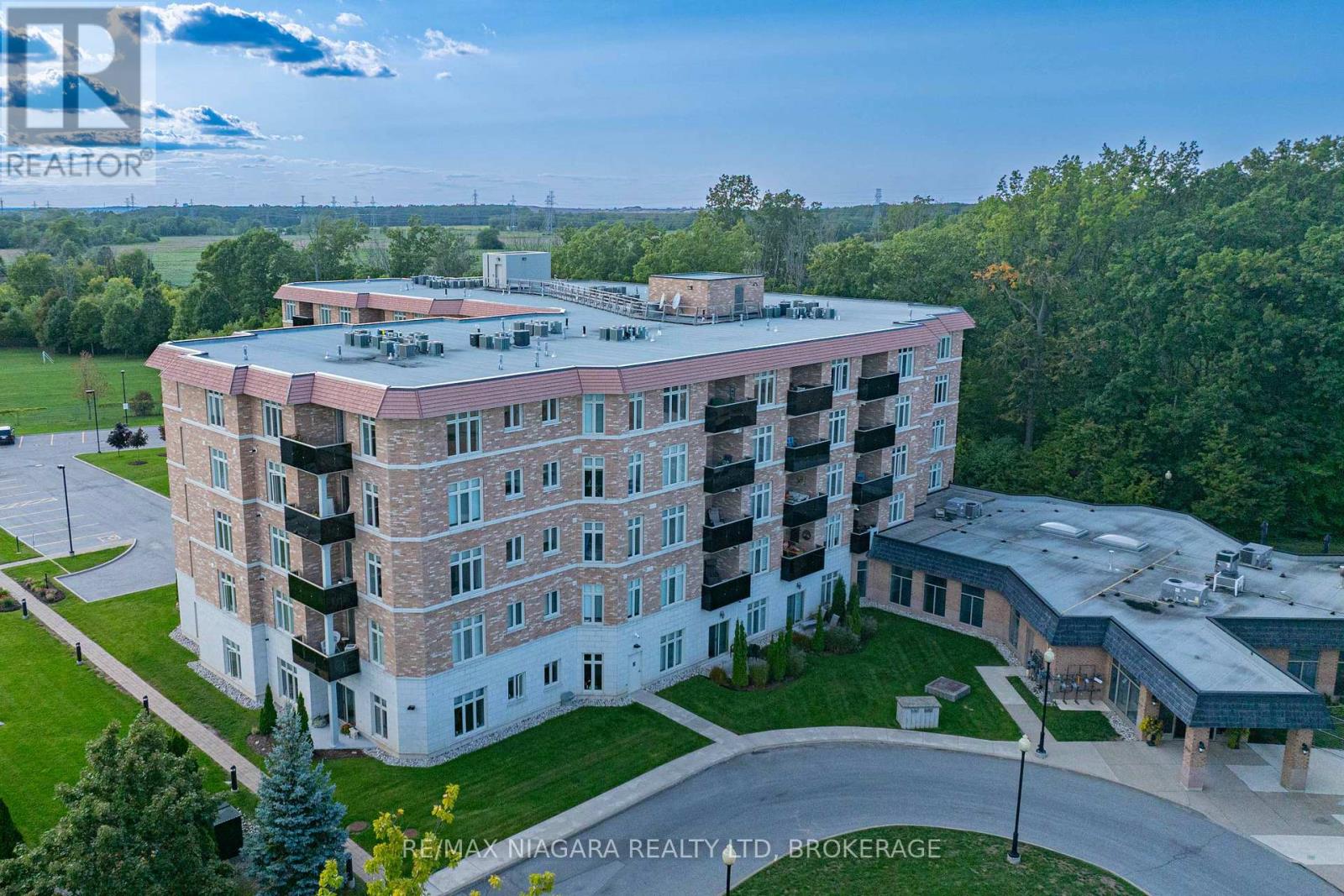 127 - 8111 Forest Glen Drive, Niagara Falls (Mt. Carmel), Ontario  L2H 2Y7 - Photo 1 - X12393085