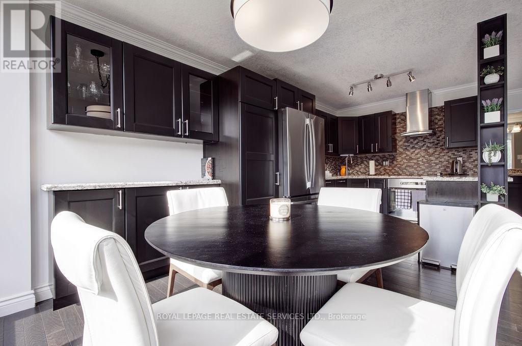 410 - 1110 Walden Circle, Mississauga, Ontario  L5J 4R3 - Photo 7 - W12389240