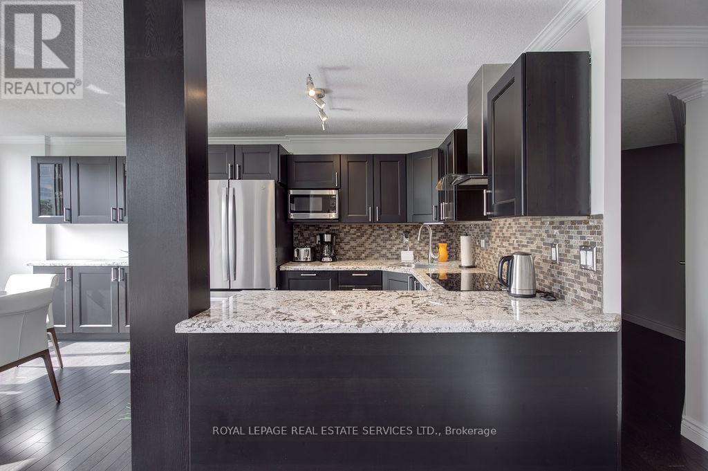 410 - 1110 Walden Circle, Mississauga, Ontario  L5J 4R3 - Photo 5 - W12389240