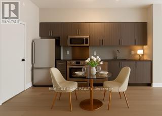 715 - 4011 Brickstone Mews, Mississauga, Ontario  L5B 0G3 - Photo 3 - W12394812
