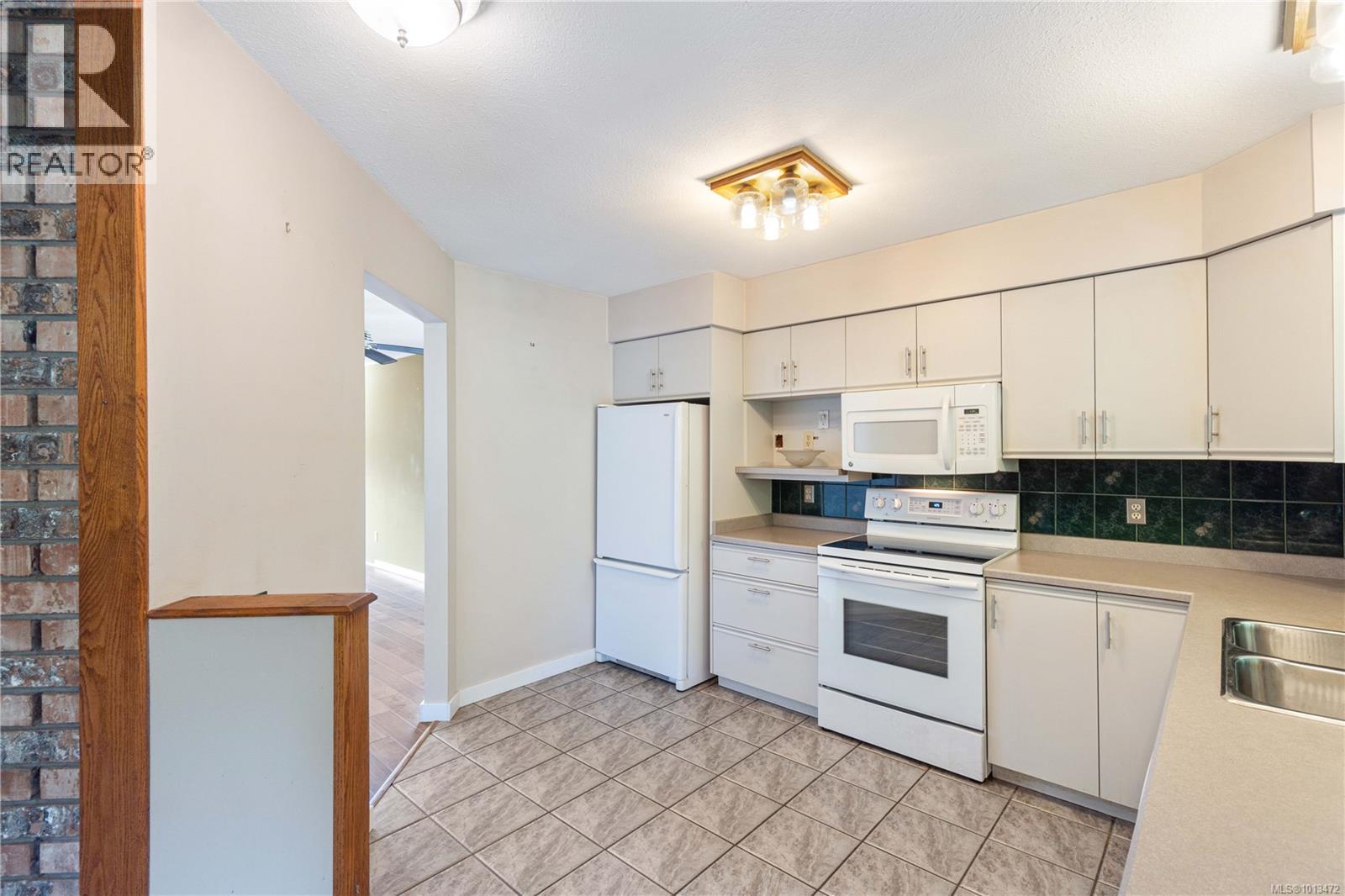 5634 Metral Dr, Nanaimo, British Columbia  V9T 2L3 - Photo 10 - 1013472