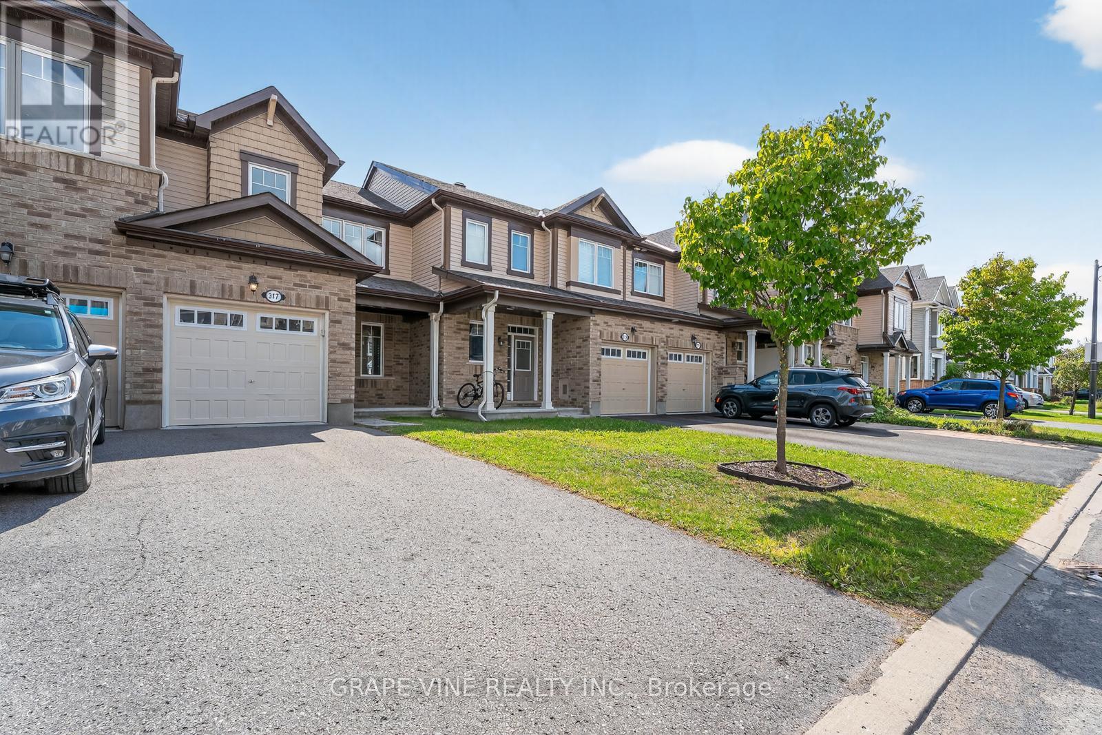 317 Song Sparrow Street, Ottawa, Ontario  K2J 0T5 - Photo 2 - X12395504