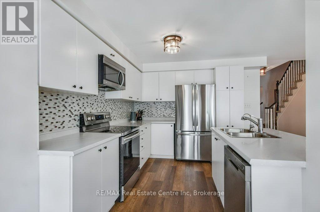 59 - 1035 Victoria Road S, Guelph, Ontario N1L 1B3 - Photo 6 - X12396270