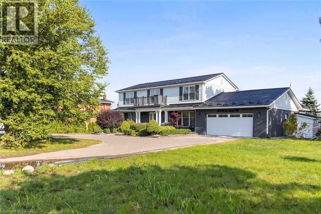 Property at 1073 N SERVICE Road image 1