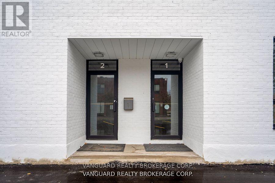1-2 - 132 Jardin Drive, Vaughan, Ontario  L4K 1X9 - Photo 3 - N12397381