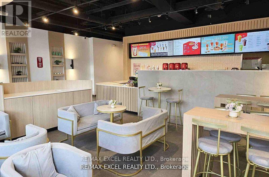 103 - 9471 Yonge Street, Richmond Hill, Ontario  L4C 0Z5 - Photo 3 - N12397918