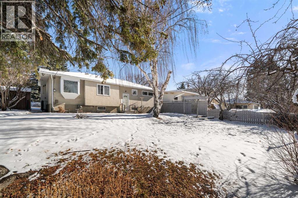 43 Canyon Drive Nw, Calgary, Alberta  T2L 0R2 - Photo 3 - A2255806