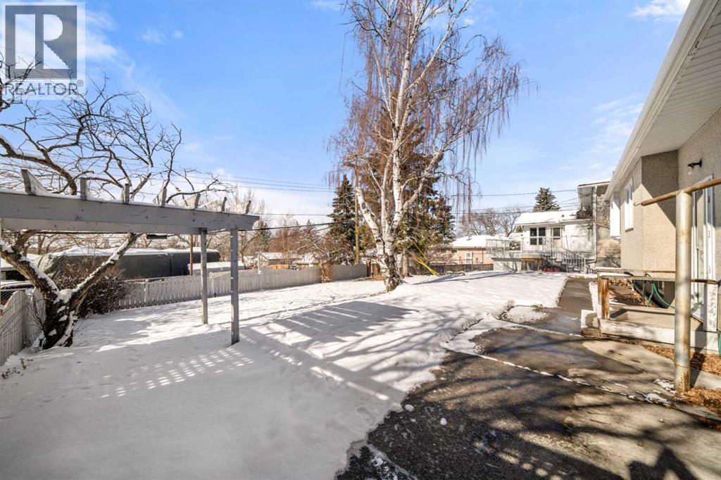 43 Canyon Drive Nw, Calgary, Alberta  T2L 0R2 - Photo 4 - A2255806