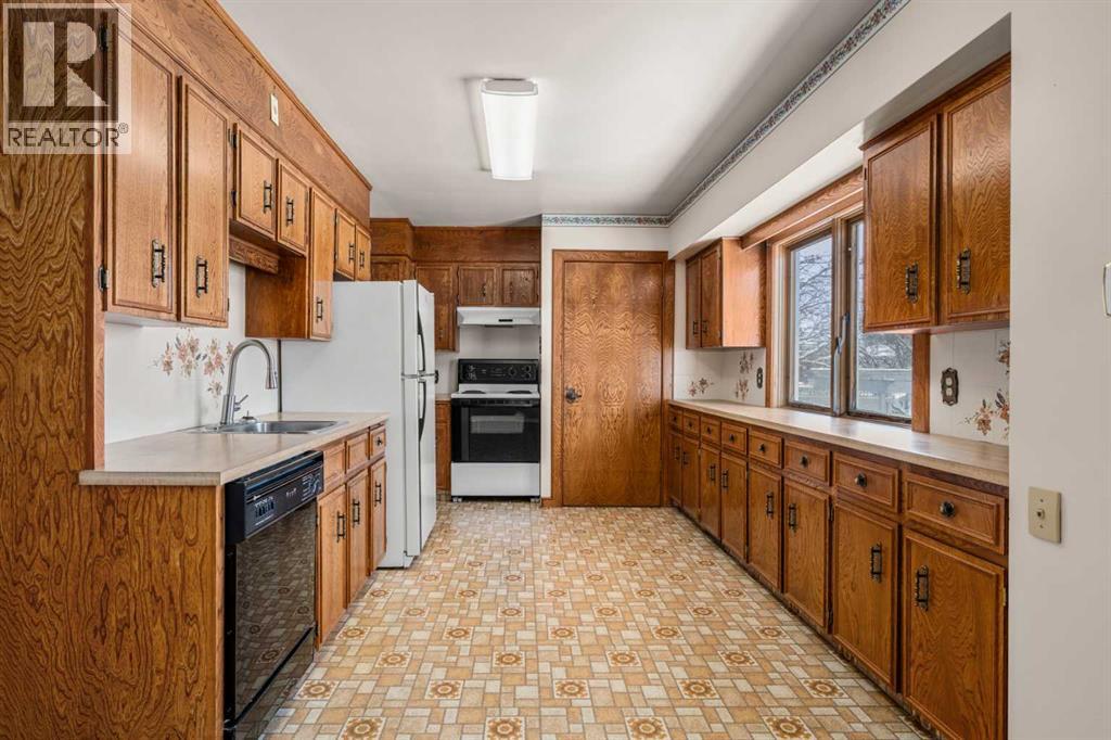 43 Canyon Drive Nw, Calgary, Alberta  T2L 0R2 - Photo 8 - A2255806