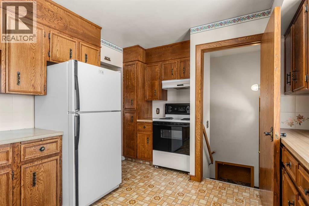 43 Canyon Drive Nw, Calgary, Alberta  T2L 0R2 - Photo 9 - A2255806