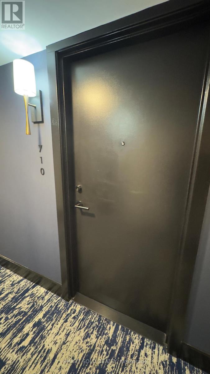 710 - 120 Dallimore Circle N, Toronto (Banbury-Don Mills), Ontario  M3C 4J1 - Photo 4 - C12398073