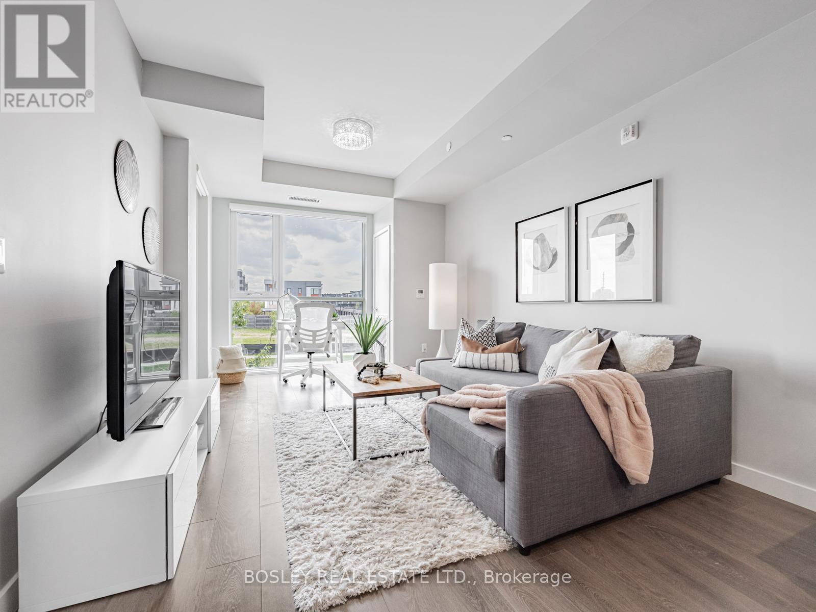 201 - 150 Sabina Drive, Oakville (Go Glenorchy), Ontario  L6H 0W3 - Photo 2 - W12398115