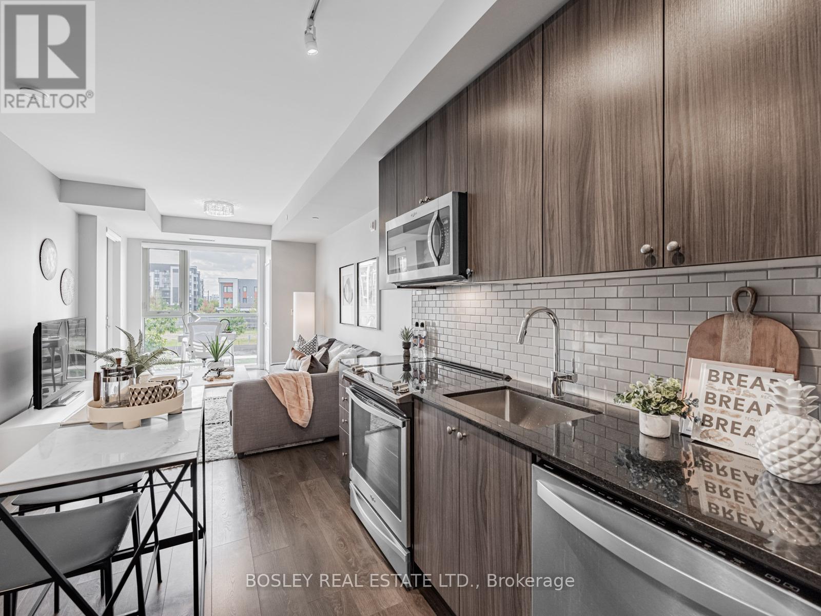 201 - 150 Sabina Drive, Oakville (Go Glenorchy), Ontario  L6H 0W3 - Photo 7 - W12398115