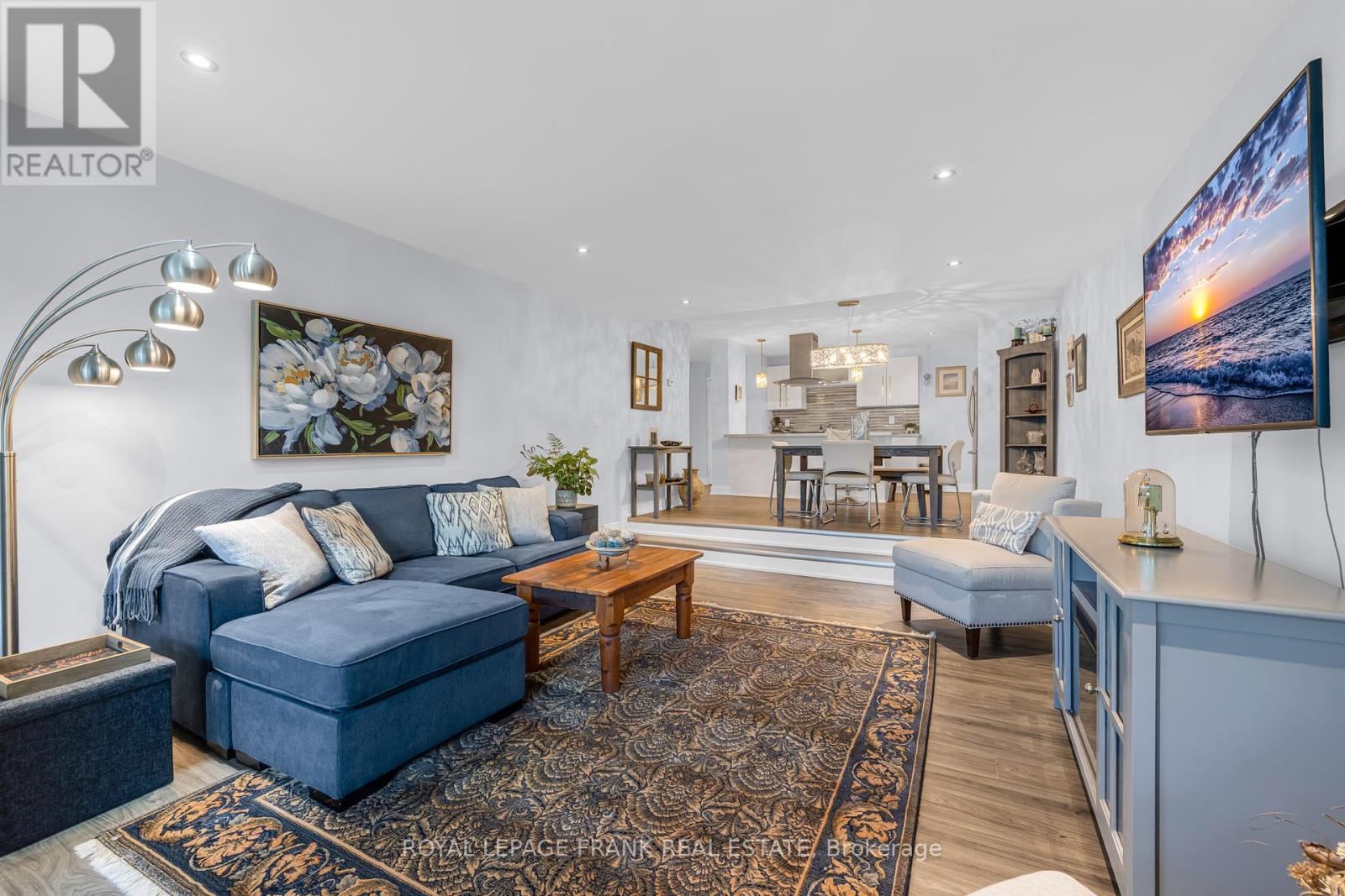 105 - 20 Speers Road, Oakville, Ontario  L6K 3R5 - Photo 2 - W12398276