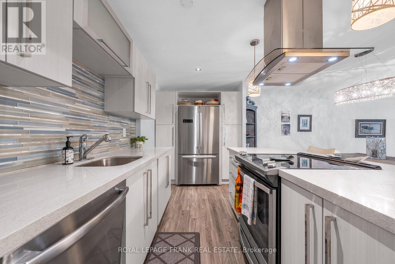105 - 20 Speers Road, Oakville, Ontario  L6K 3R5 - Photo 6 - W12398276