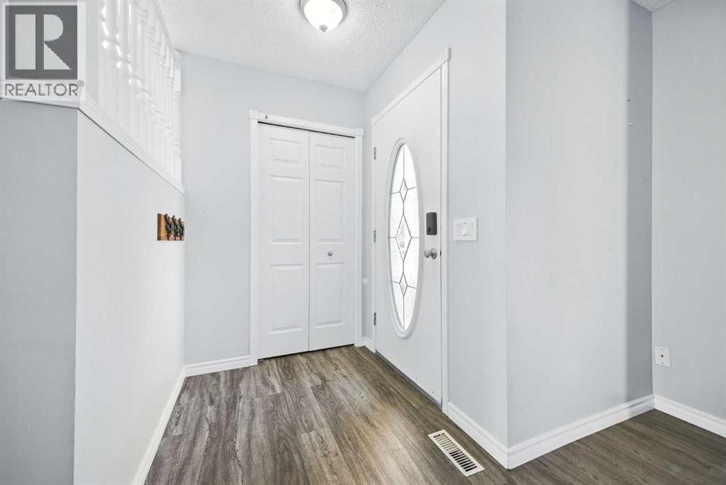 120 Hidden Ranch Hill Nw, Calgary, Alberta  T3A 5X7 - Photo 4 - A2256385