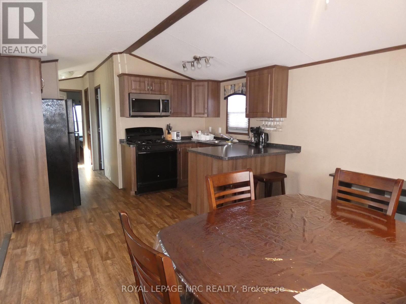 110 - 1501 Line 8 Road, Niagara-On-The-Lake, Ontario  L0S 1J0 - Photo 7 - X12398608