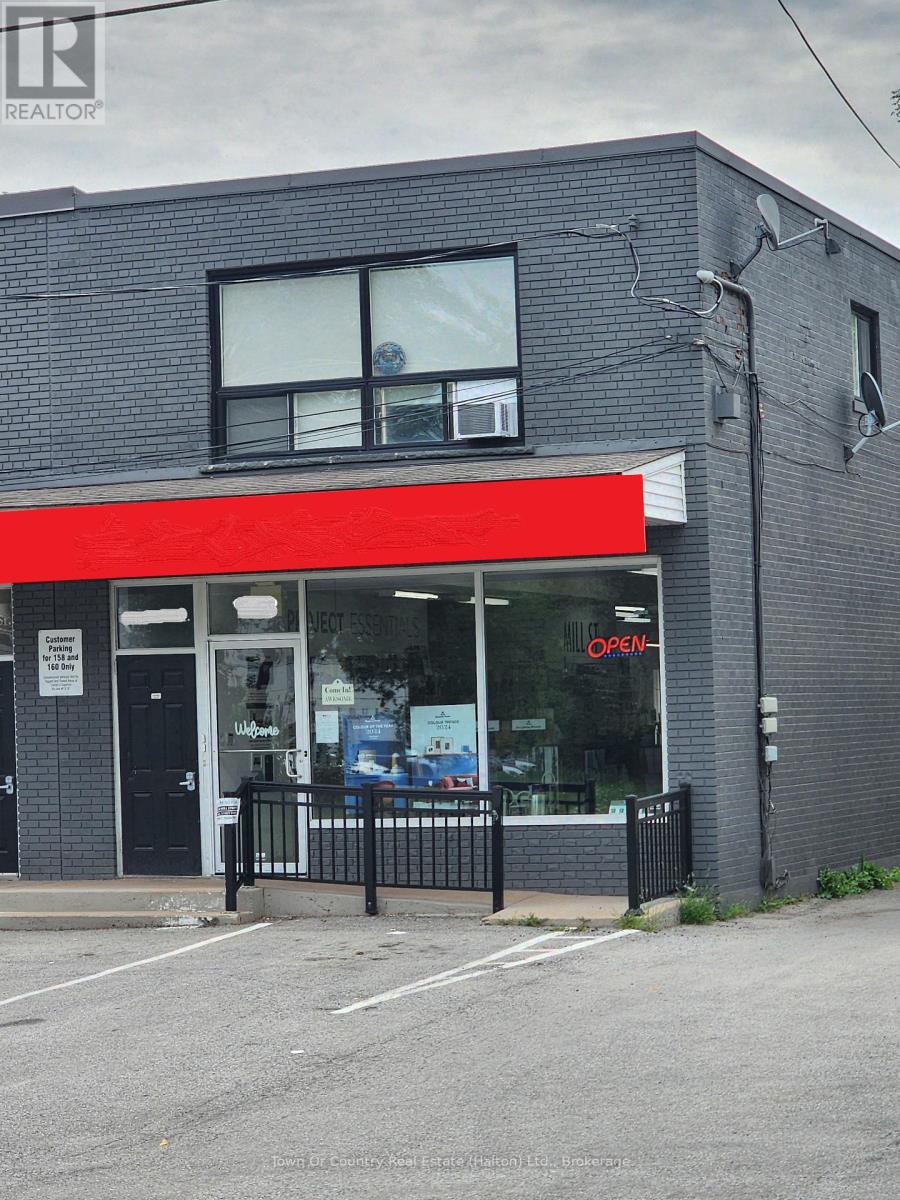 101 - 158 Mill Street, Milton, Ontario  L9T 1S2 - Photo 1 - W12398746
