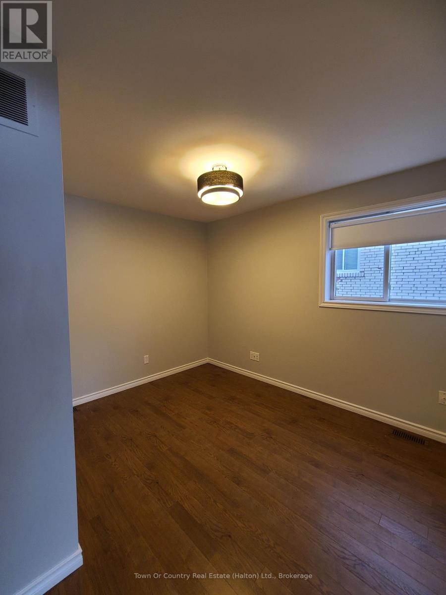 101 - 158 Mill Street, Milton, Ontario  L9T 1S2 - Photo 6 - W12398746