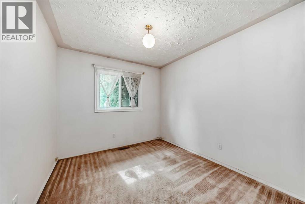 352 Malvern Close Ne, Calgary, Alberta  T2A 4W7 - Photo 26 - A2256394