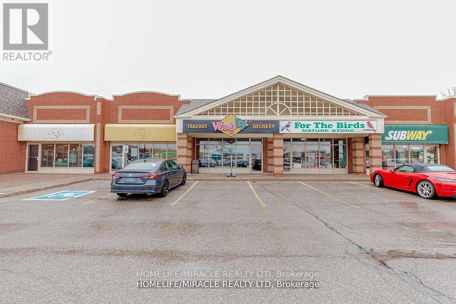 E - 163 First Street, Orangeville, Ontario  L9W 3J8 - Photo 2 - W12398854