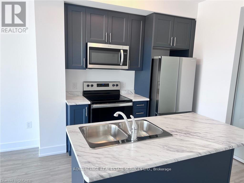 329 - 460 Dundas Street E, Hamilton, Ontario  L8B 2A5 - Photo 2 - X12398826
