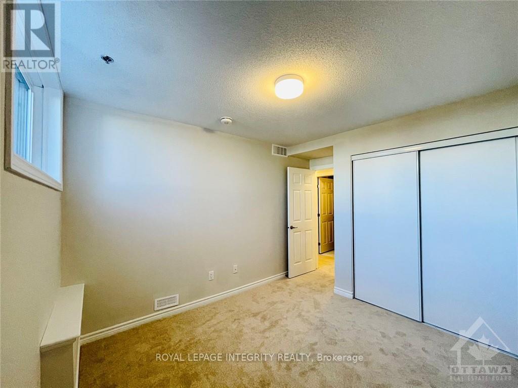 124 Michael Stoqua Street, Ottawa, Ontario  K1K 5A8 - Photo 8 - X12398946