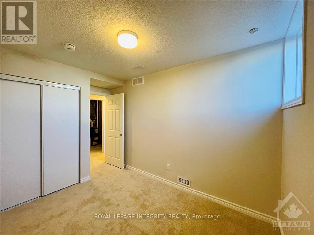 124 Michael Stoqua Street, Ottawa, Ontario  K1K 5A8 - Photo 9 - X12398946